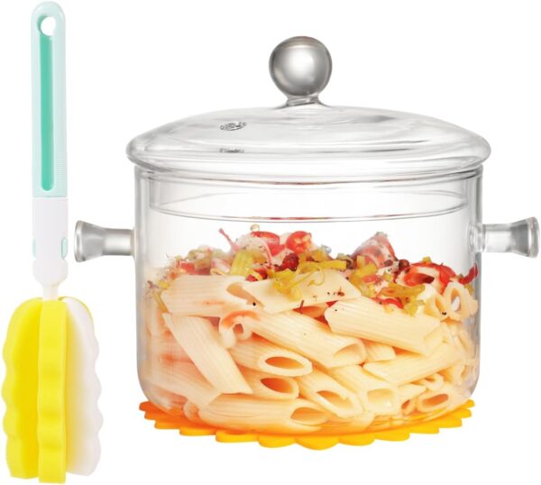 Clear Glass Cooking Pot With Lid And Brush And Silicone Hot Pads On Stove.